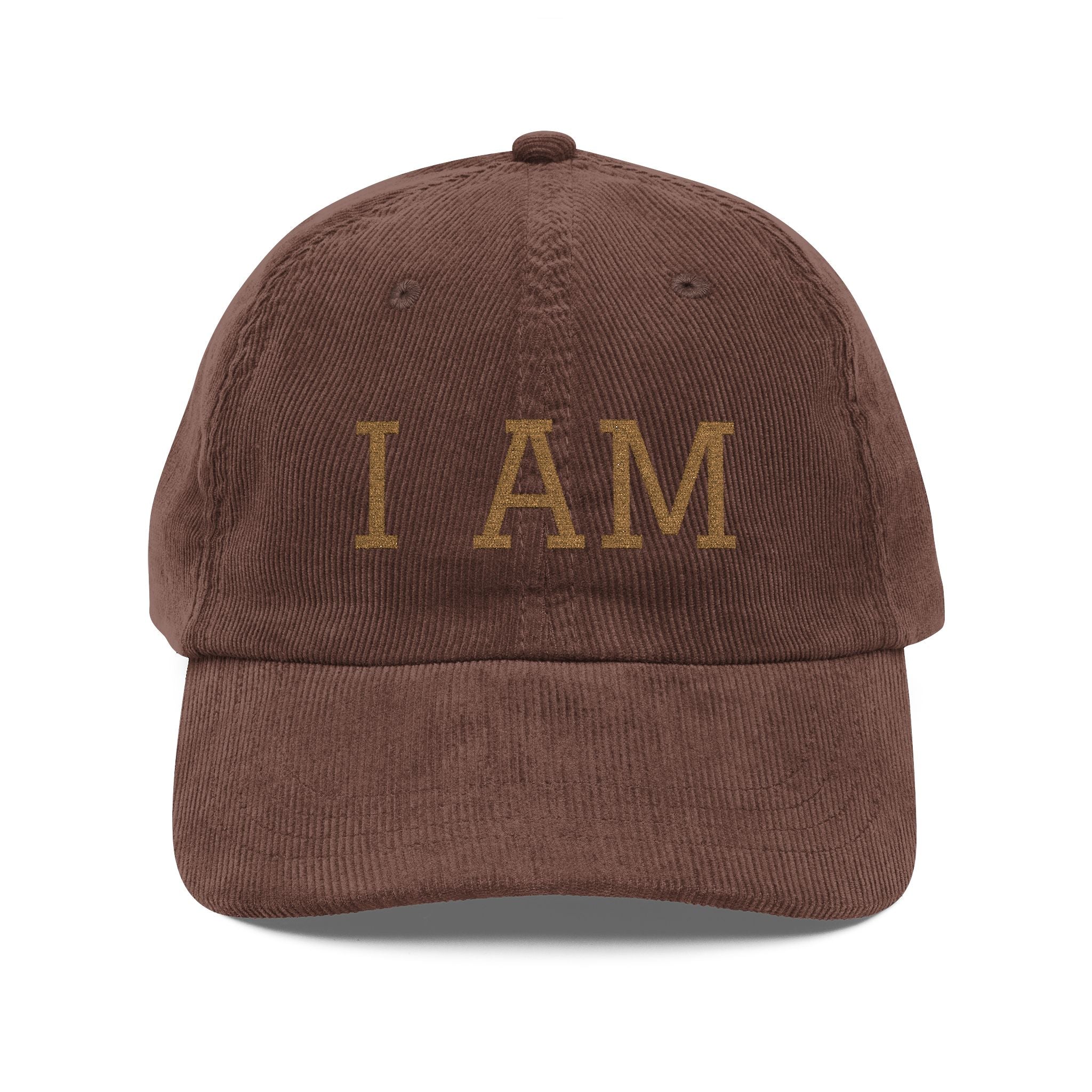 Brown cap with 'I AM' text on a white background
