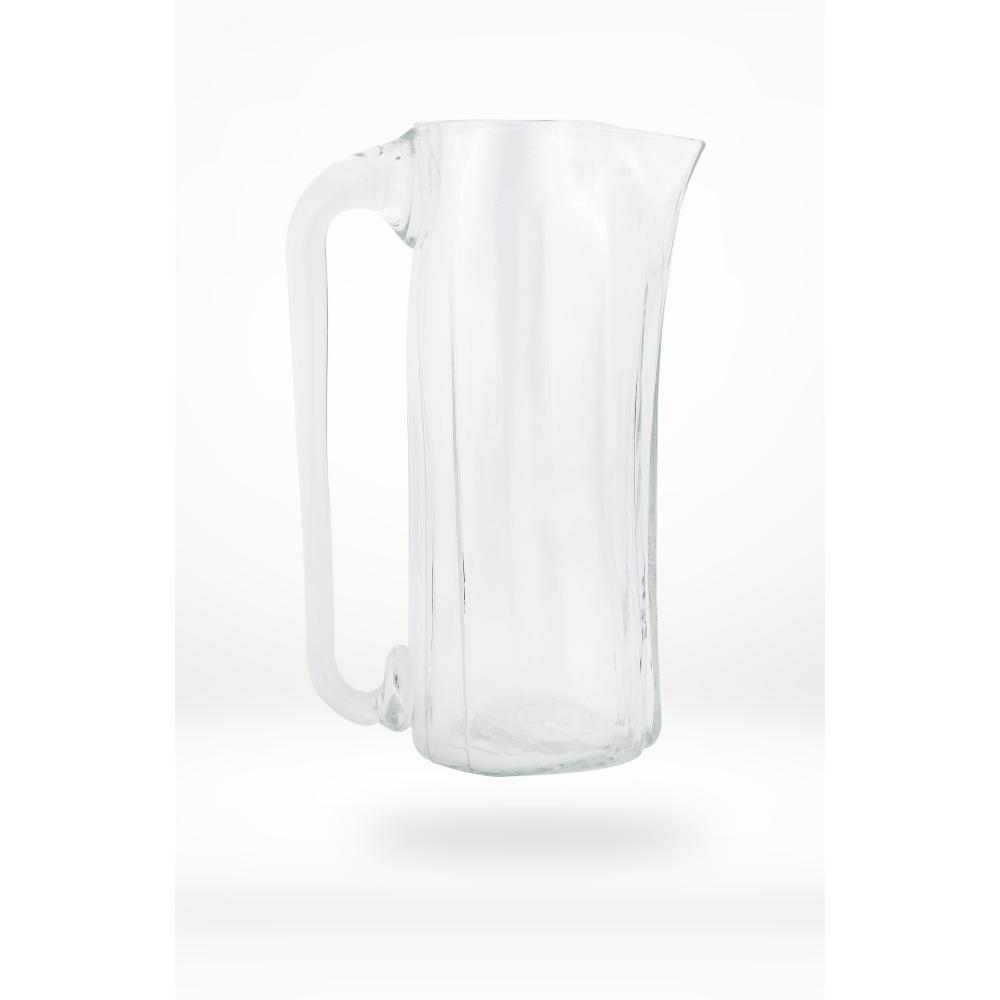 Clear glass pitcher on a white background