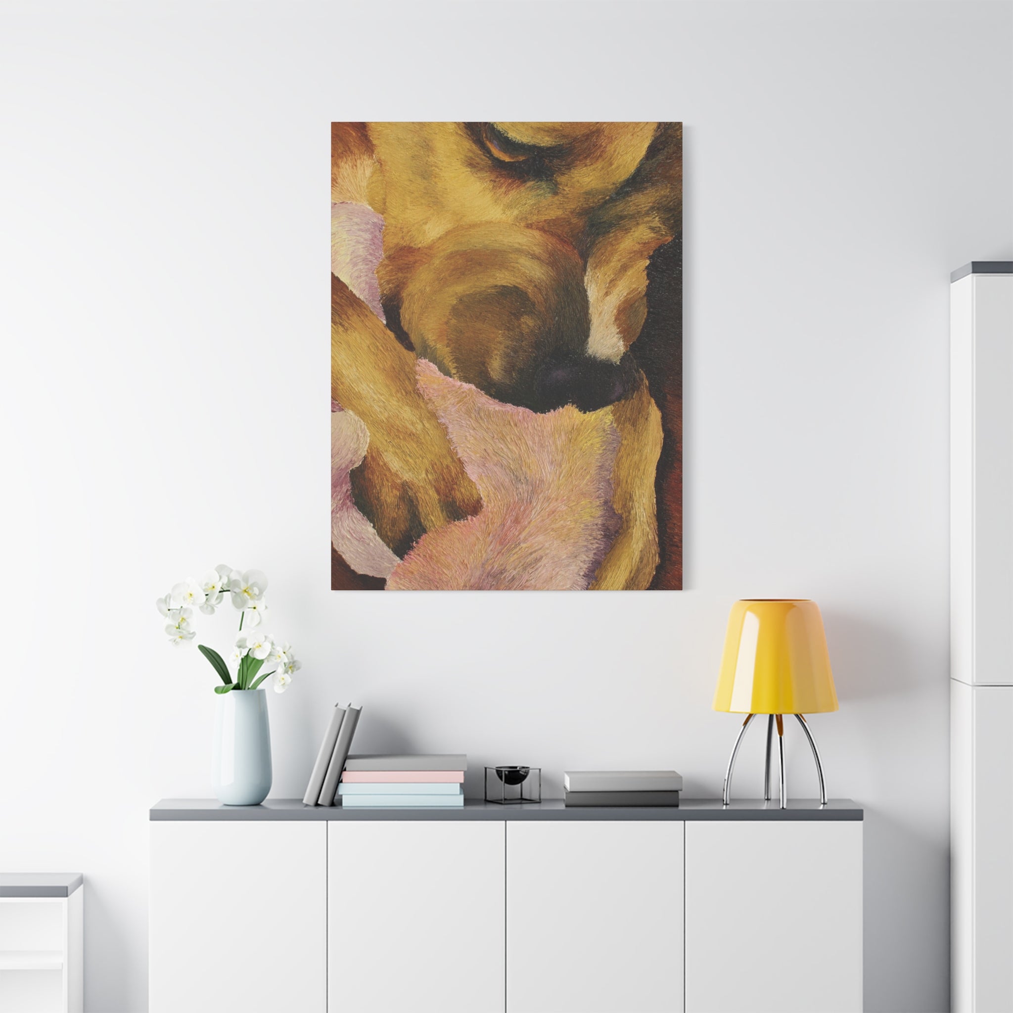 Artistic depiction of a dog's face on a wall above a white cabinet with decorative items.